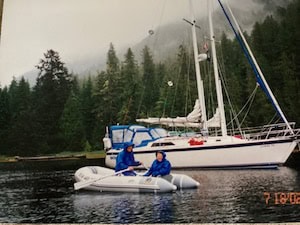 Brad & Joyce Jensen with their sailboat