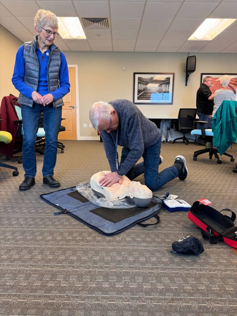 Carl Petterson practicing CPR