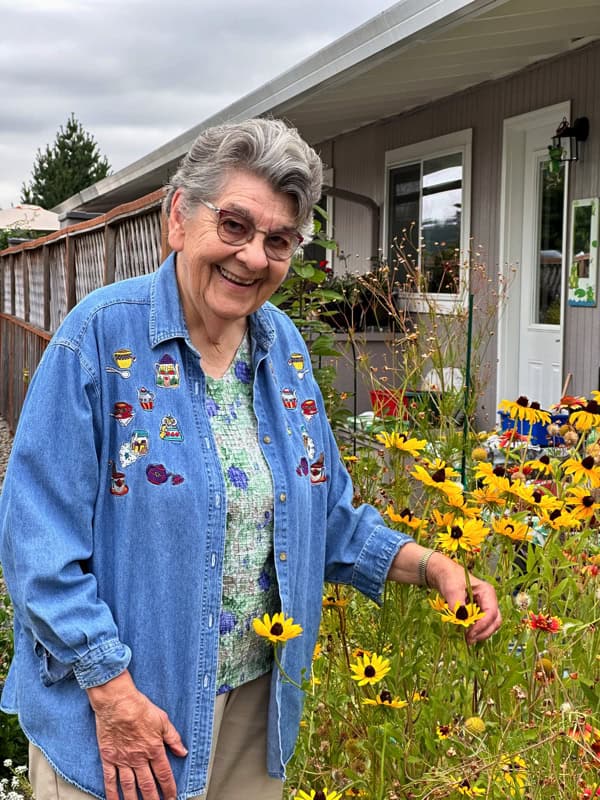 Marcia Krueger in her garden