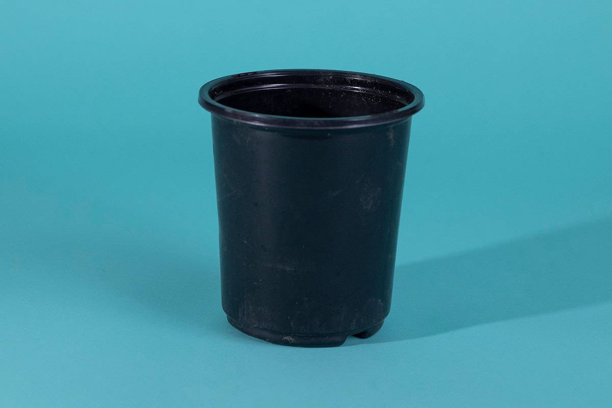 Plastic garden pot over 4 inches in diameter