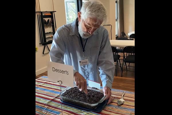 George Converse slicing zucchini cake