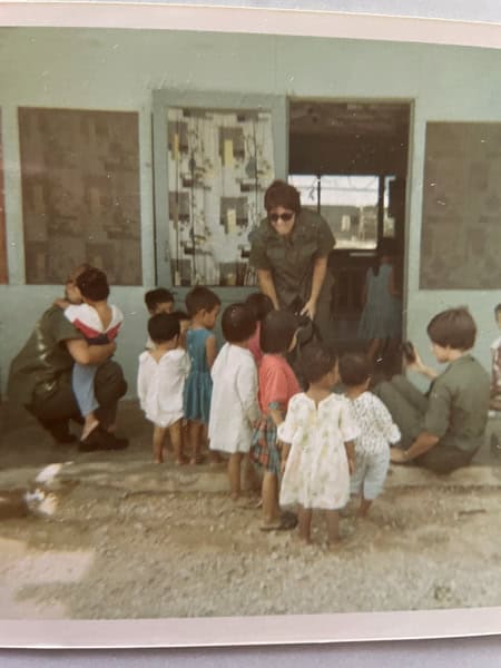 Sue Griffin with kids in Vietnam