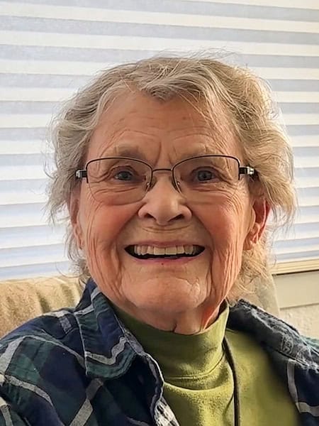 Smiling woman with glasses